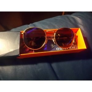 Orange by TIJN Story of your eyes polarized glasses round.